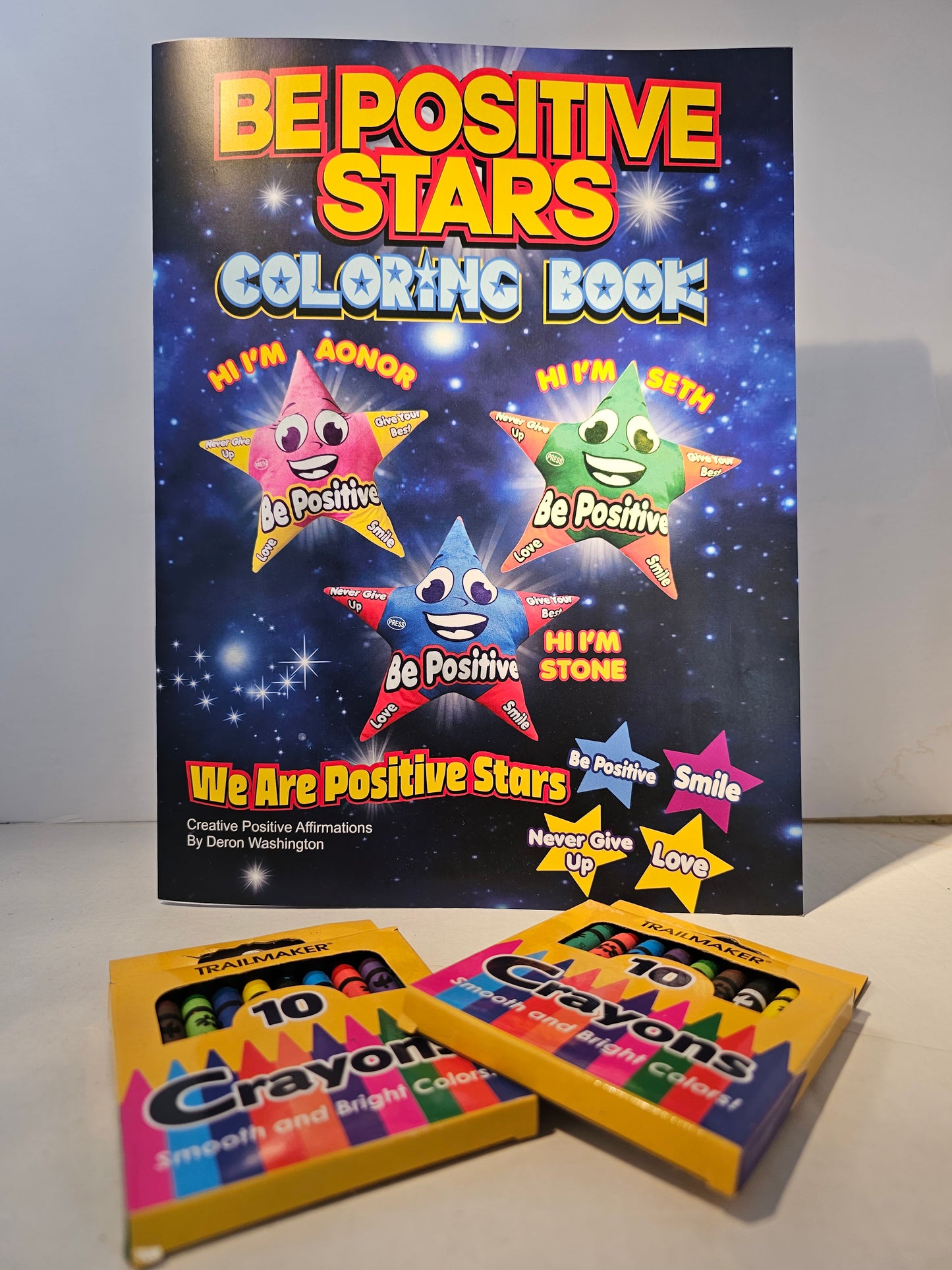 Positive Star Coloring Book with crayons.